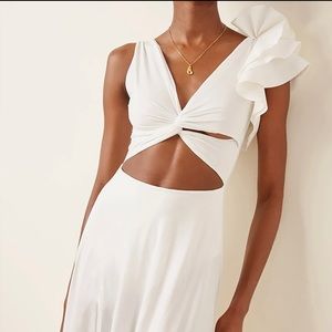 COPY - Ruffle cutout beach dress. Size M.  It looks white in the pictures but it
